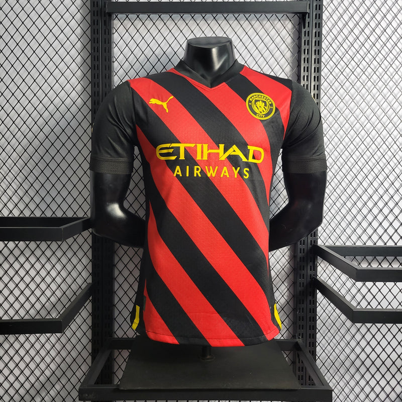 CAMISA VERSÃO PLAYER DO MANCHESTER CITY 22/23 VERMELHO E PRETO - VELOP SPORTS