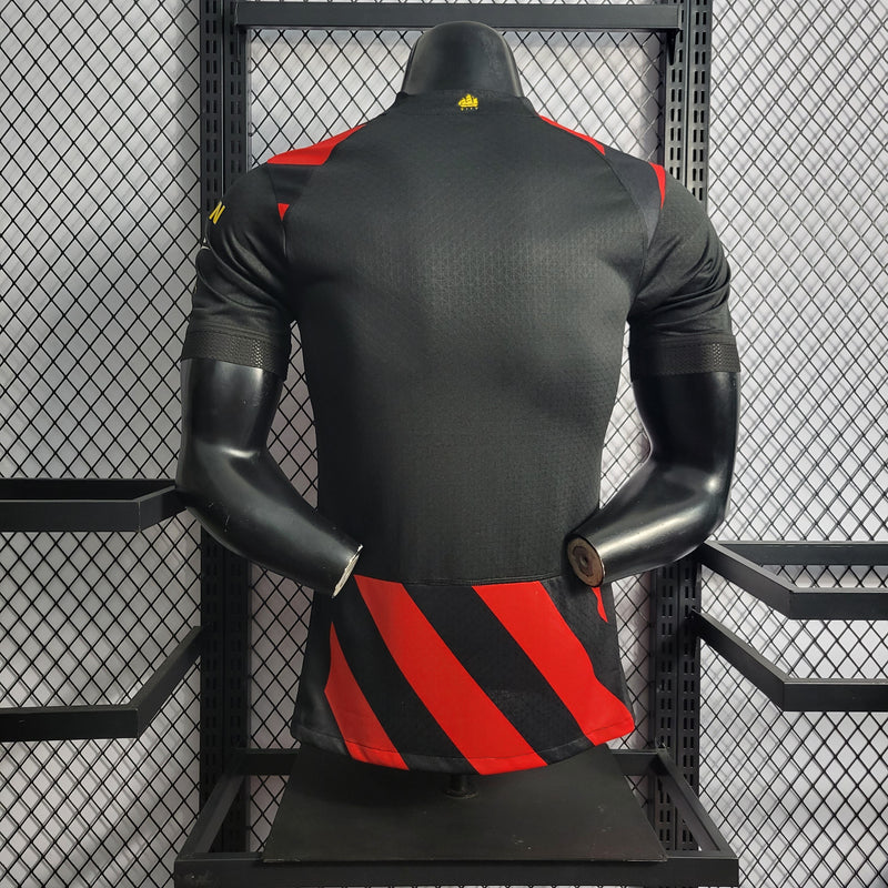 CAMISA VERSÃO PLAYER DO MANCHESTER CITY 22/23 VERMELHO E PRETO - VELOP SPORTS