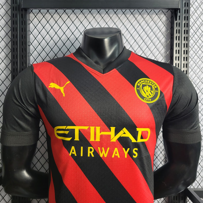 CAMISA VERSÃO PLAYER DO MANCHESTER CITY 22/23 VERMELHO E PRETO - VELOP SPORTS